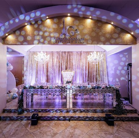 Texan bride and groom taking photo outside of private wedding reception venue - Alegria Gardens