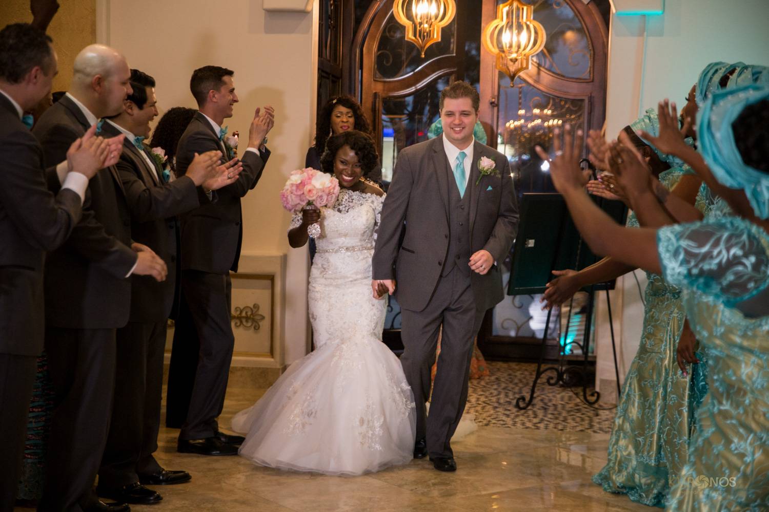 Bride and Groom entering Houston event hall for wedding reception - Alegria Gardens Bride and Groom entering Houston event hall for wedding reception - Alegria Gardens