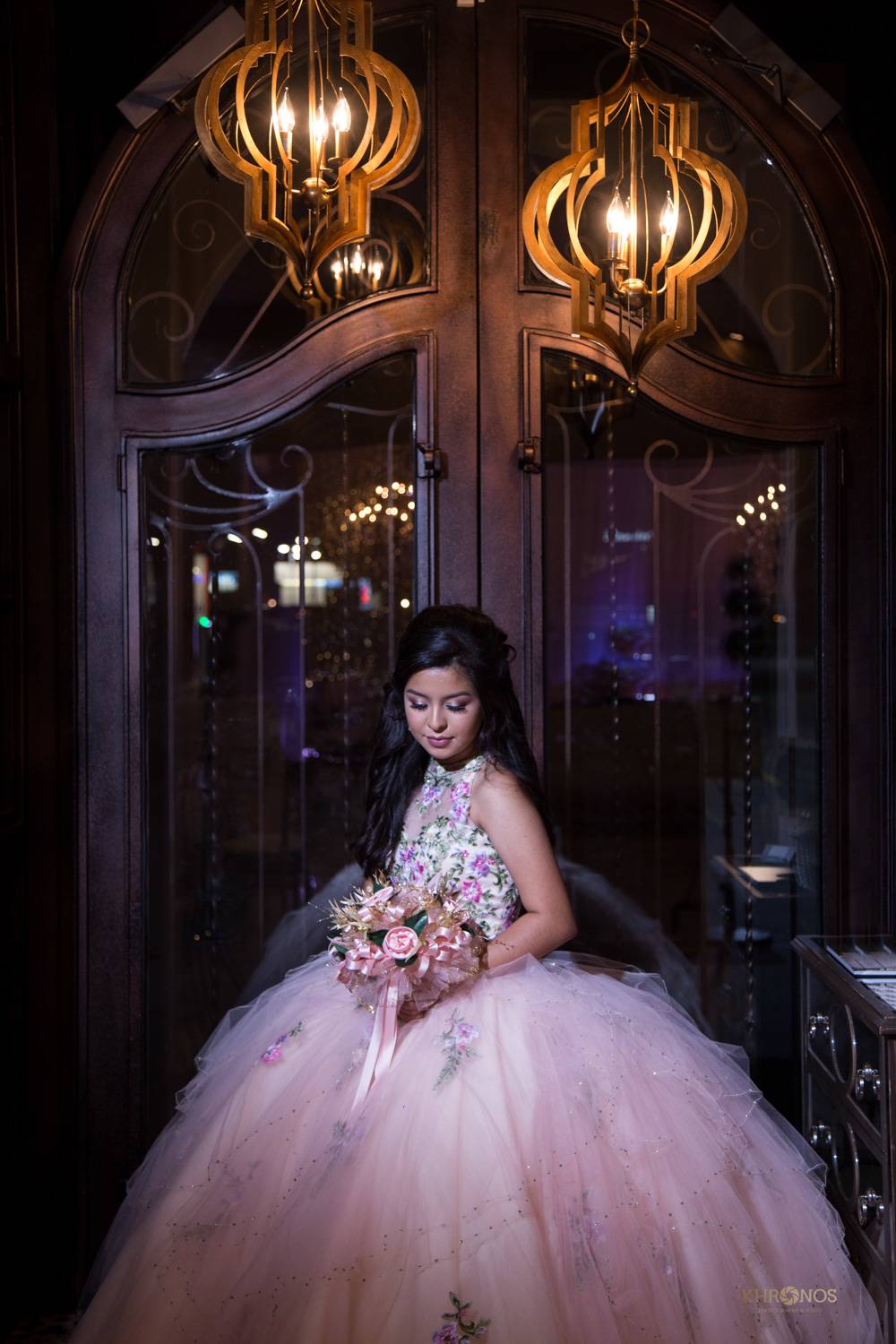 Birthday celebrant wearing flowery pink gown with bouquet - Houston Private Event Venue - Alegria Gardens Birthday celebrant wearing flowery pink gown with bouquet - Houston Private Event Venue - Alegria Gardens